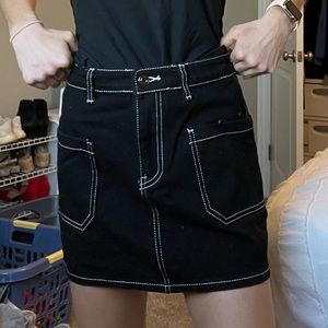 Mini black denim skirt